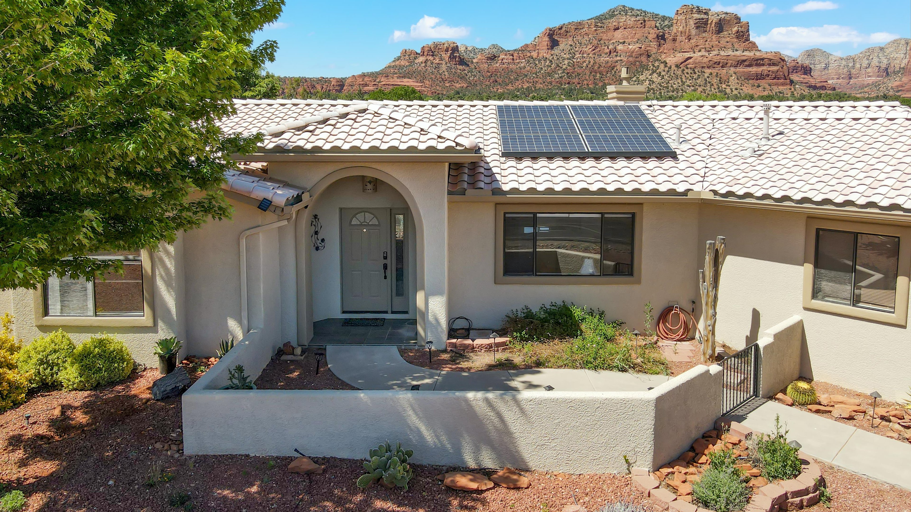 Drone view of the property with Bell Rock in the background