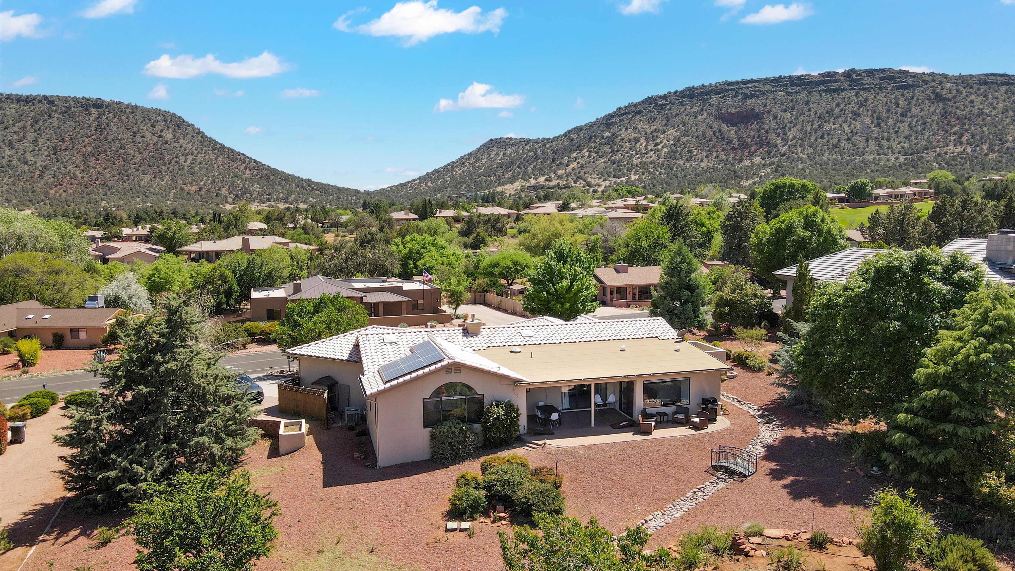 Drone shot showing the property layout and backyard